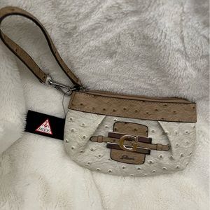 Small clutch purse. Guess.